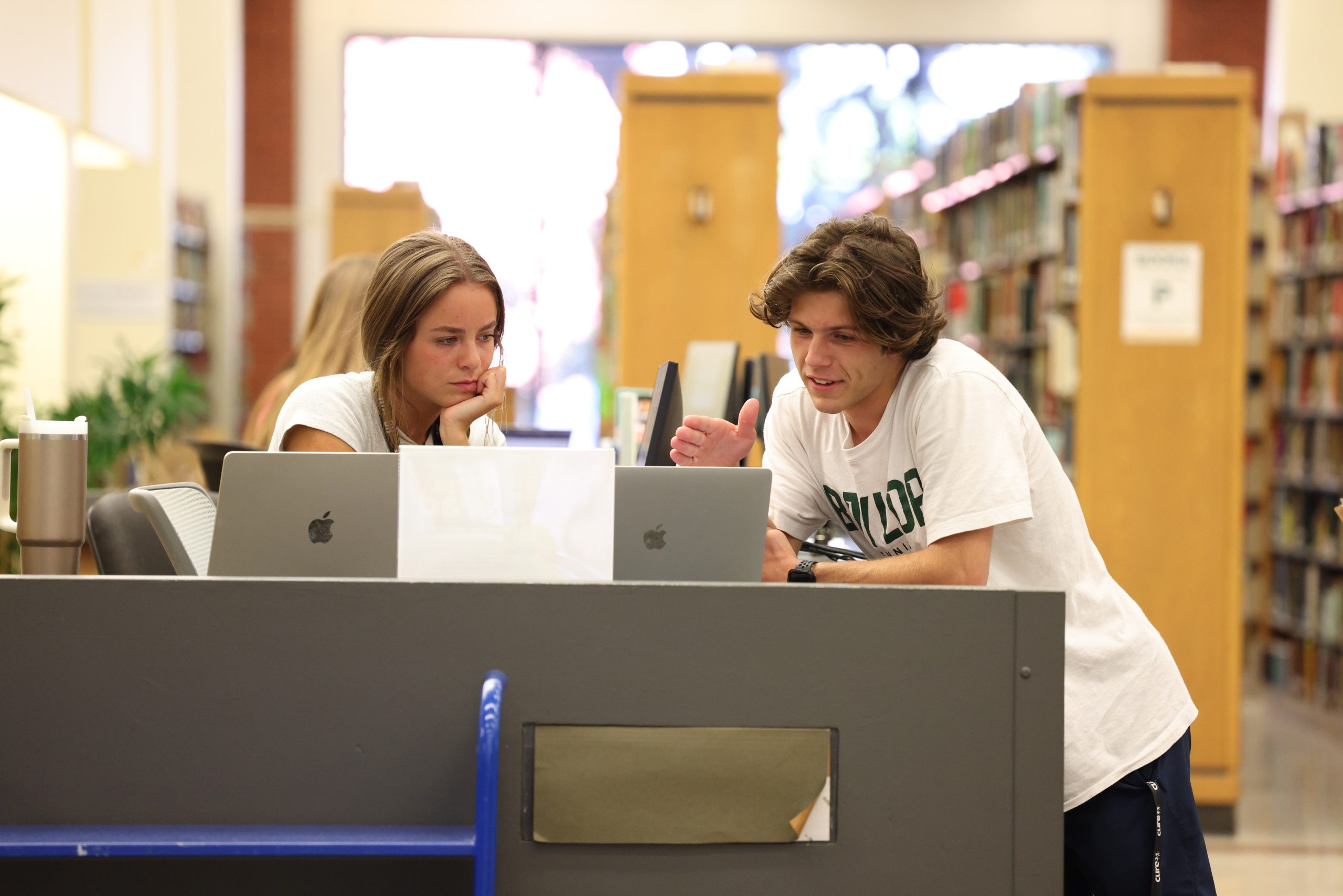 Baylor students working at laptops